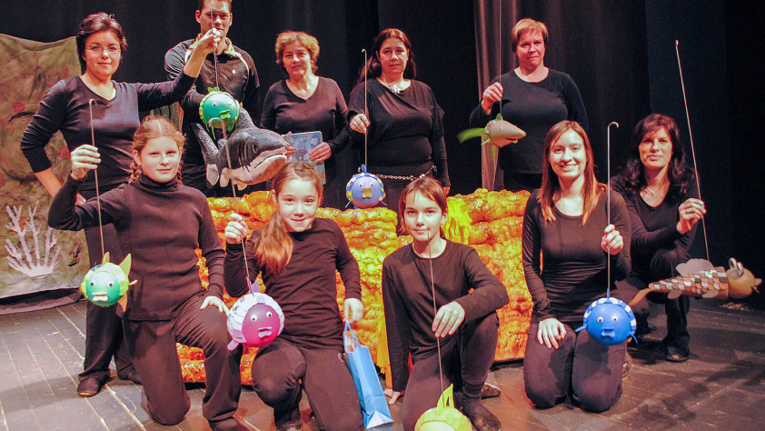 Mavrična ribica, na pomoč!